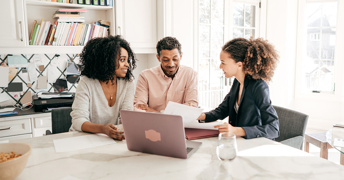 Bank employee offering technical assistance to black entrepreneurs