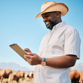 Agriculture business owner on ipad