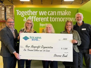 Stearns Bank employees with nonprofit donation