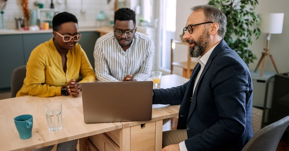 Couple talking with Banker about account options