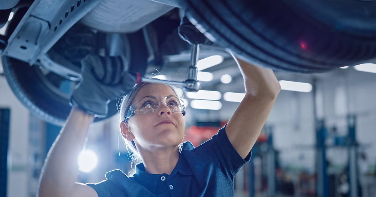 Business owner working with financed manufacturing equipment