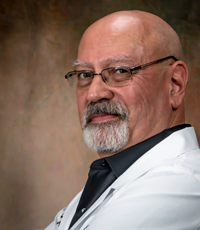 Dr. Larry Ward