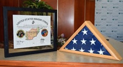 Plaque and American flag presented to Stearns Bank by Wounded Warriors Family Support