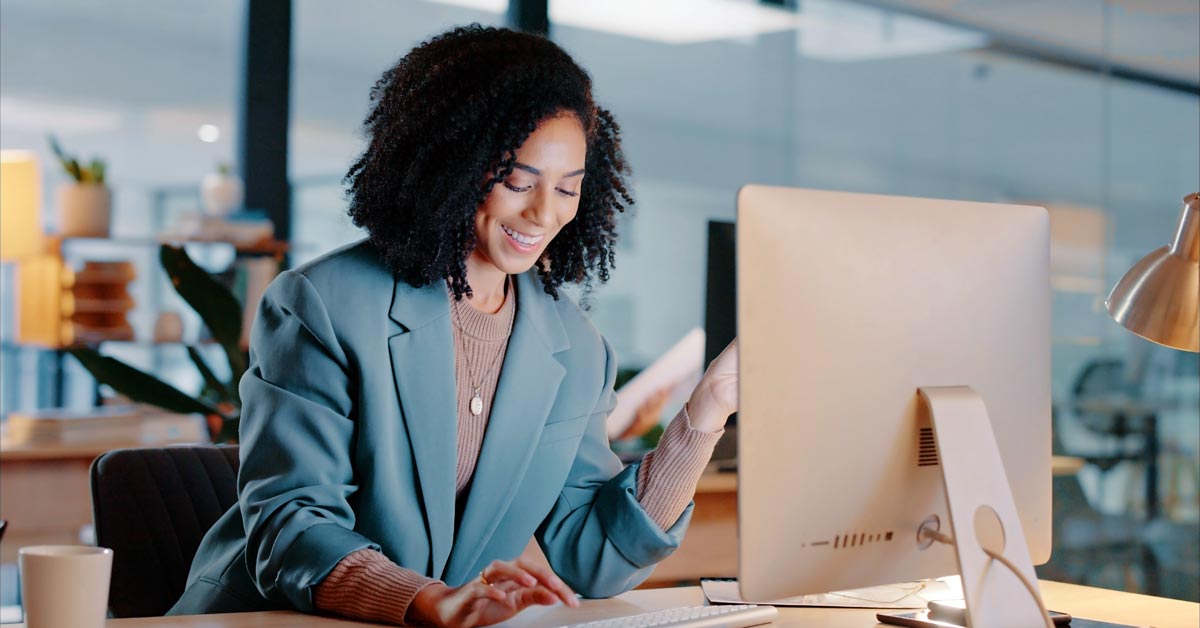 Young business owner working on her computer 