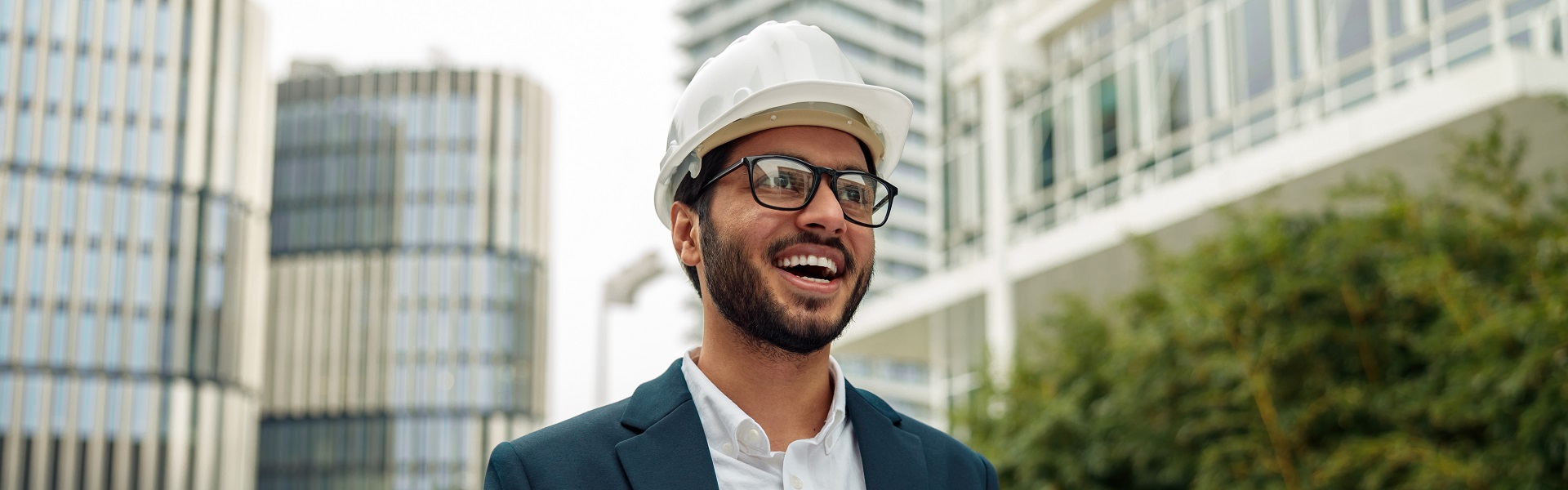 Smiling man wearing hardhat-1 Smiling man wearing hardhat-1