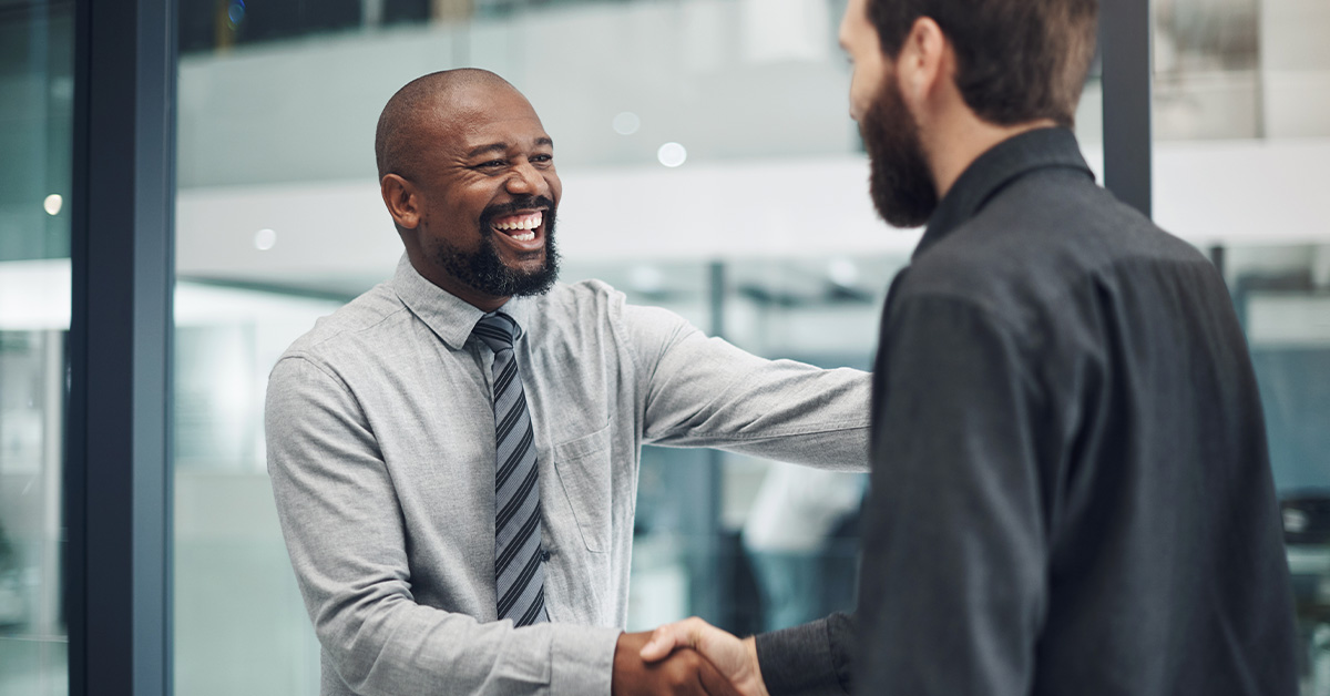 Two businessmen shaking hands 