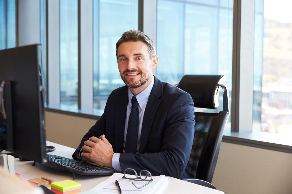 Businessman sitting at a desk 