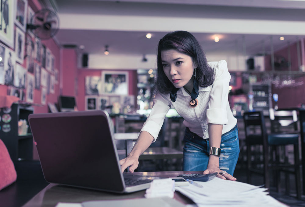business owner at computer